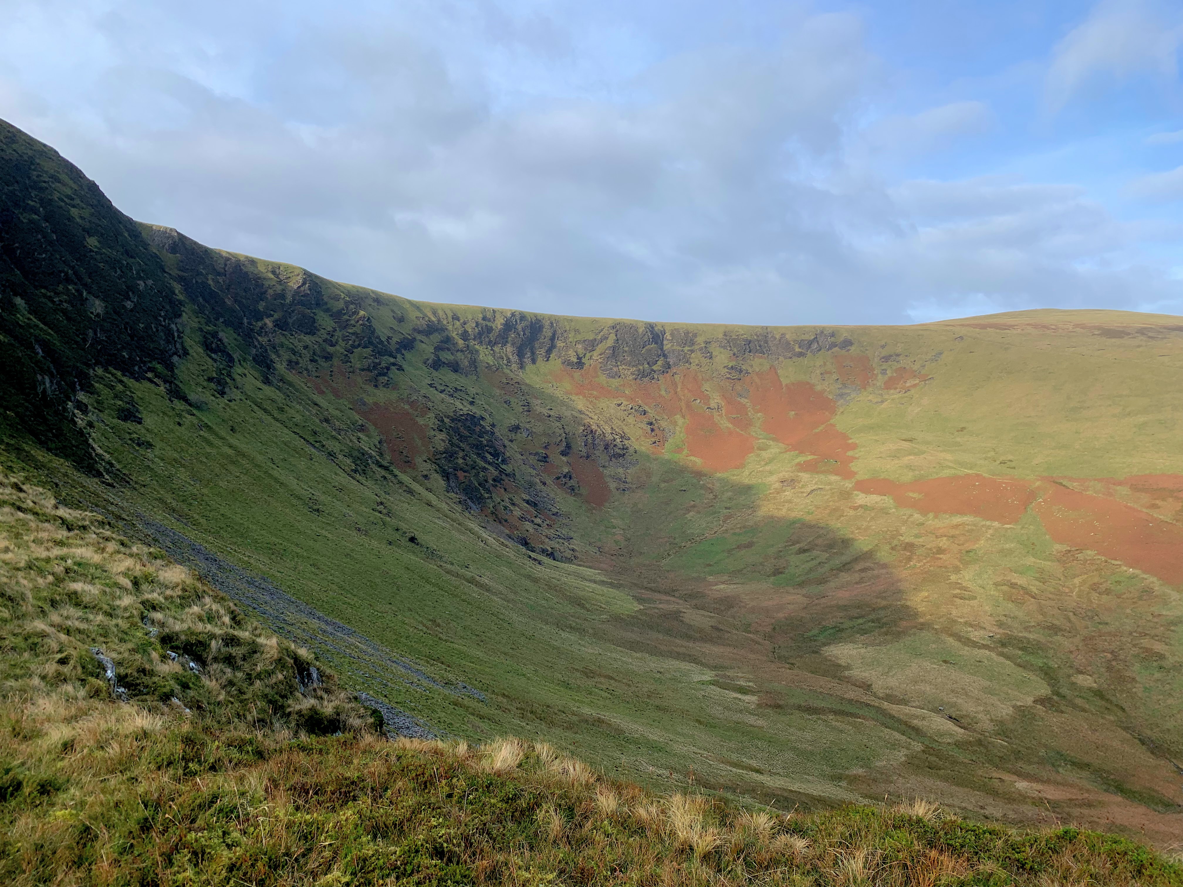 Only 7miles but with a strenuous 2,000ft of ascent. This hike takes in 2 to 4 Wainwrights depending on the route you choose (you would  have to opt out of the tarn for the 4th). Starting in Mungrisdale, to reveal some stunning views of Bannerdale Crags, Sharp Edge and Blencathra. With the original route, you will complete Bannerdale Crags and Bowscale Fell (with a descent via Bowscale Tarn) but you can tweak the route to include Souther Fell and Tarn Crag.